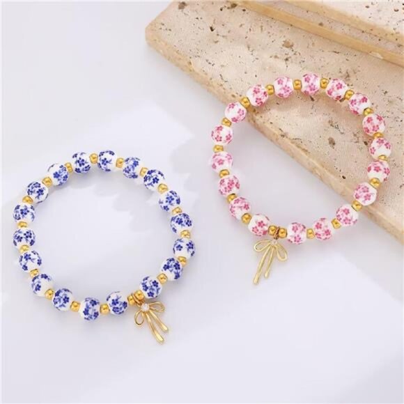 🌸 Set of 2 Floral Ceramic Bead Bracelets | Pink & Blue | Gold Bow Charm Accents - Picture 4 of 6